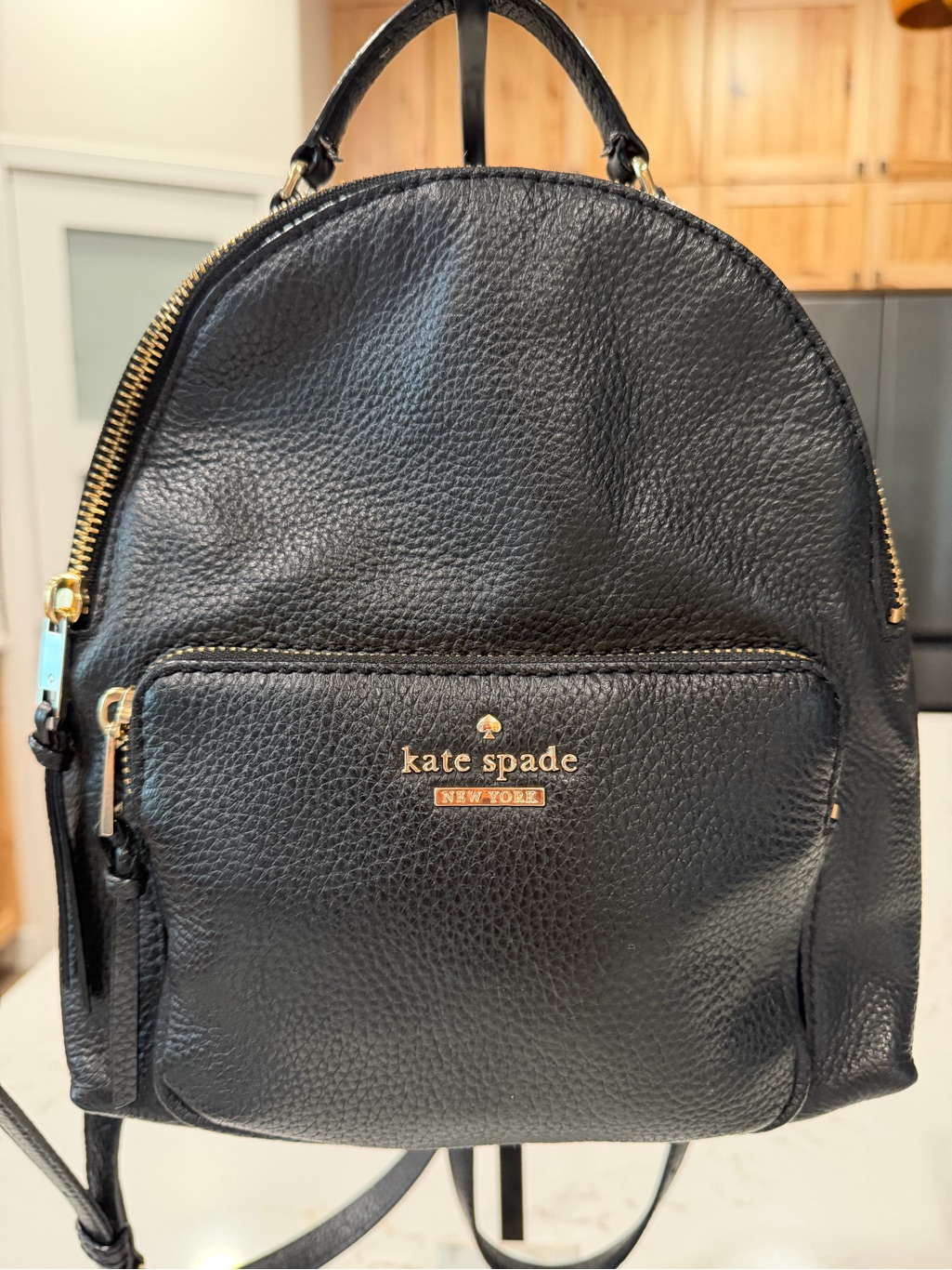 Kate Spade Black Pebbled Leather Backpack With Gold Hardware Striped Interior